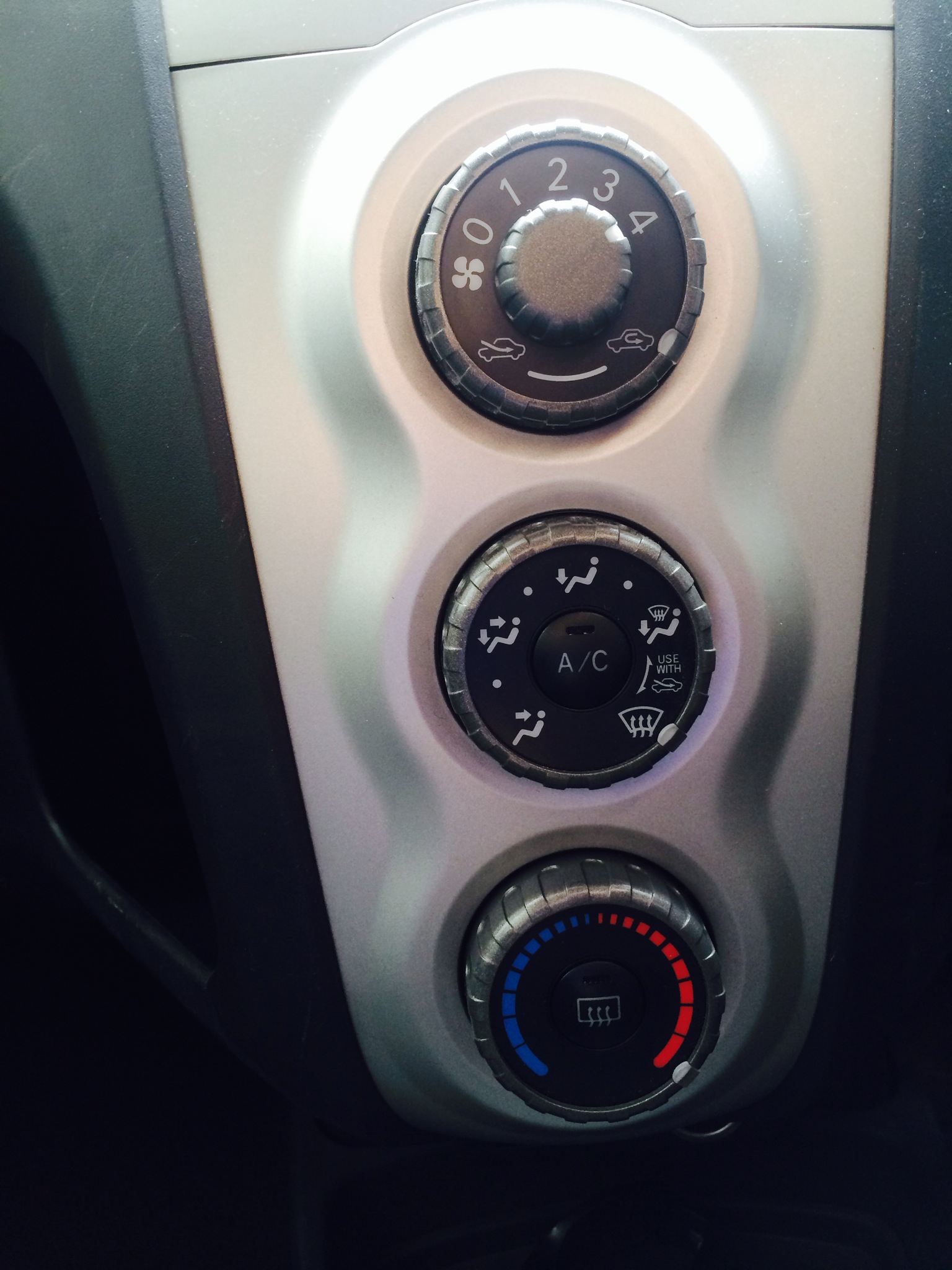 control air condition button in car - show me tell me